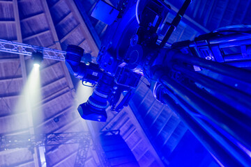 television camera. camera in a concert hall