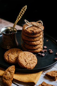 oatmeal cookies with chocolate on the table with coffee in turkey