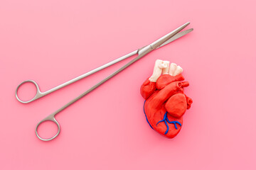 Surgical instruments and heart model. Heart surgery concept