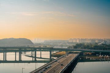 Fototapeta na wymiar Panoramic view of Daejeon city and Gapcheon river at sunrise in Korea