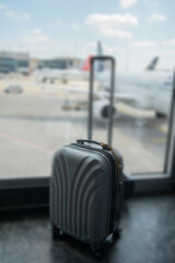  close up suitcase on blurred airport background