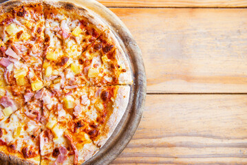 Hawaiian Piiza on tray, ready to serve