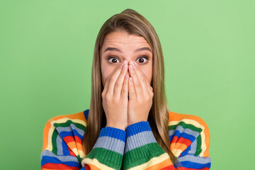 Photo portrait girl shut face with hands staring shocked amazed isolated pastel green color...