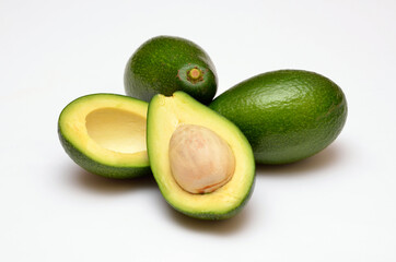 cutaway avocado fruit halves on a white background close-up