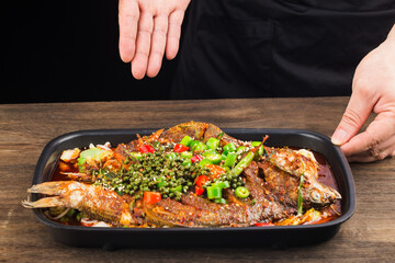 Chinese Cuisine: a plate of spicy roast fish