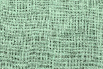 Green burlap with beautiful canvas texture of green fabric in retro style with beautiful green fabric canvas texture as green vintage burlap background with burlap texture and beautiful burlap color