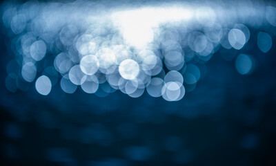 Christmas and New Year festive bokeh background. Abstract bokeh blurred light. Space for holiday text