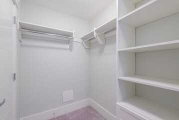 Empty closet, working closet, cupboard in bedroom.