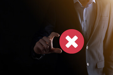 Hand holds icon,cancellation symbol,cancel icon.Cross mark flat red icon.round X mark.cancel...