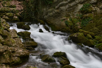 river flows in the rocks
