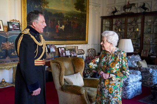Britain's Queen Elizabeth receives General Sir Nick Carter, Chief of the Defence Staff, during an audience in the Oak Room at Windsor Castle, in Windsor