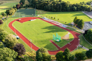 Aerial view of a athletics running track and 3G astroturf football pitch