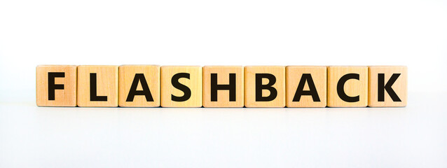 Flashback symbol. The concept word Flashback on wooden cubes. Beautiful white table, white background. Business and flashback concept. Copy space. - obrazy, fototapety, plakaty