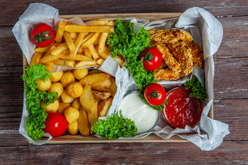 Business lunch in paper container ready for delivery. Top view. Office Lunch boxes with food ready to go. Food takes away. 