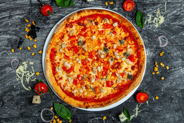 Pizza carbonara with mozzarella, bacon, gorgonzola cheese, parmesan cheese