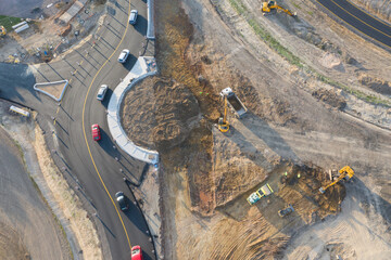 Roundabout under construction Top down aerial view of a traffic roundabout. Aerial view. Solving...