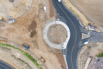 Roundabout under construction Top down aerial view of a traffic roundabout. Aerial view. Solving...