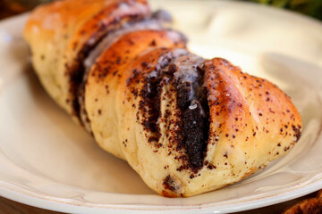 Christmas poppy seed cake on a plate.