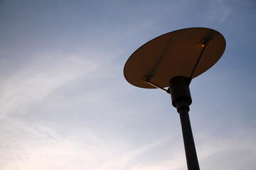 The design lamp and the empty blue sky