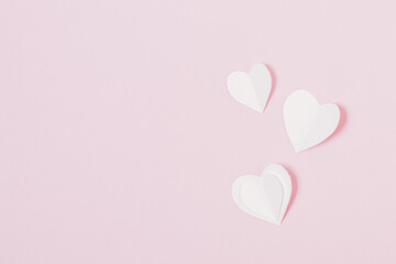 Plakat Valentines Day composition with paper hearts on pink background