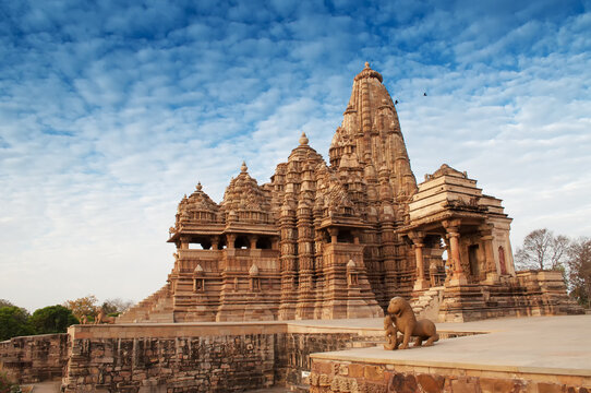 Kandariya Mahadeva Temple, dedicated to Shiva, Western Temples of Khajuraho under cloudy sky, Madya Pradesh, India. Khajuraho is UNESCO World heritage site and is popular tourist destination.