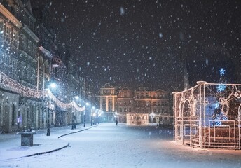 Late-night snowing at the Old Town square in Poznan, Poland