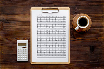 Documents work with taxes or bills with taxes report on office desk, top view