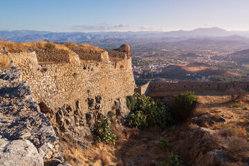 Fototapeta na wymiar Ancient Greek fortress of Palamidi with stone walls on top of hill with vast panoramic view, Greece