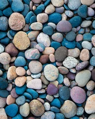 Fotobehang Colorful smooth stones on the shore of Lake Superior in Michigan © gnagel
