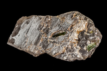 Macro stone tourmaline mineral on a black background