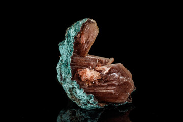 Macro of a stone Albite mineral on a black background