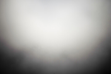 Black material texture background picture with light and shining smoke