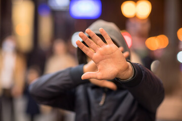 hand stop sign on bokeh background