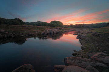 Sunset reflected in the waters of the river