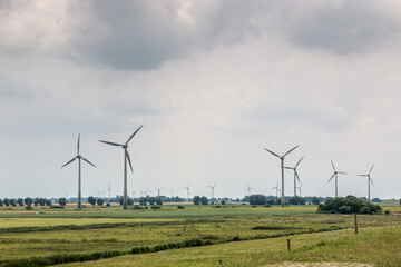 Wind wheels for renewble energy on the flat marshland of North Germany