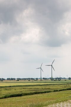 Wind wheels for renewble energy on the flat marshland of North Germany