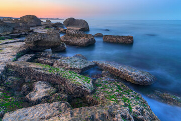 Fototapeta na wymiar Coast of the Caspian Sea at sunset.