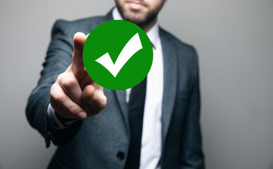 man clicks the checkmark icon