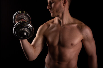 Fototapeta na wymiar Man Pumping Biceps with Dumbbell Topless. Sprotsman Doing Traning on Biceps Muscles. Gym, Lifting Sport Concept. Close Up