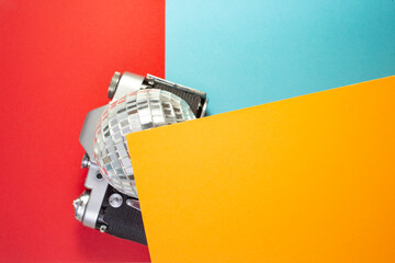 colored shapes with vintage objects blurred in the background