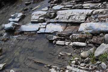 stone wall with water
