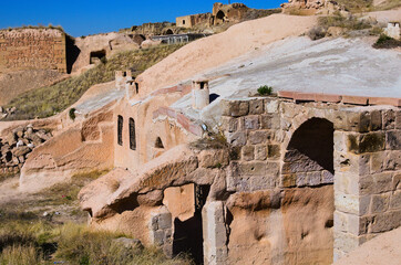 Close-up view of ruins of houses in the cave. Picturesque landscape view of ancient cavetown near Goreme in Cappadocia. Popular travel destination in Turkey. UNESCO World Heritage Site