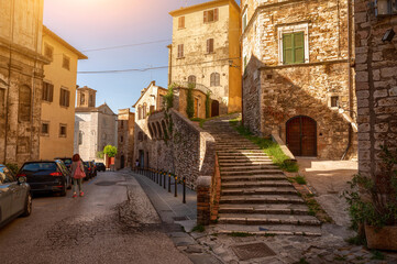 Perugia, Umbria, Italy. August 2021. A charming alley winds its way between the houses of the historic center.