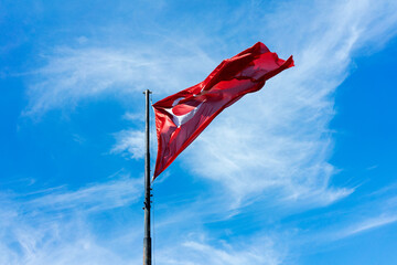 Turkey flag in the blue sky - 469783457