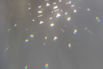 Rainbow light crystal leak overlay background. Prism glass flare effect texture. Sunlight rays, iridescent prismatic © Julia Klintsova