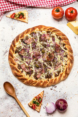 Delicious Pizza Classic Homemade Tomato Sauce Sausage Cheese Onion Meat Pasta Shrimp Restaurant Menu Gourmet on a wooden table