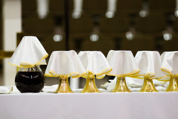 golden cups in the church for communion