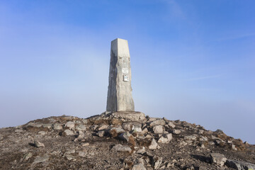 Stone obelisk on the top of Maly Krivan, Mala Fatra, Slovakia. Landmark on the mountain and hill....