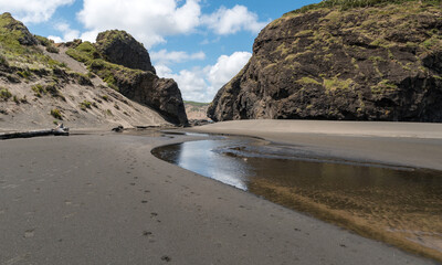 Whatipu cliffs and islands, Whatibu beach near Auckland