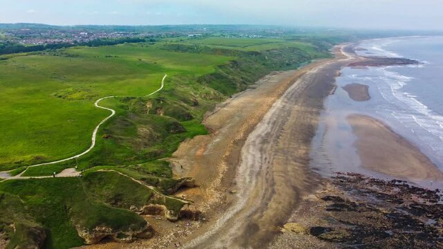 Cliffs and beach at Blackhall Rocks and Cromdon Dene Beach